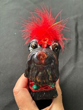 Decorative Black Scottie Dog Pet Ornament with Red Feather Accent